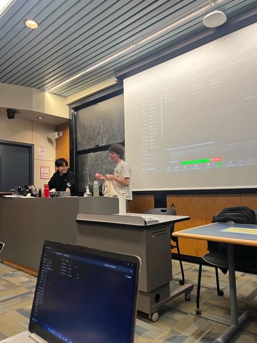 Joshua teaching the backend course at the front of a Cornell classroom